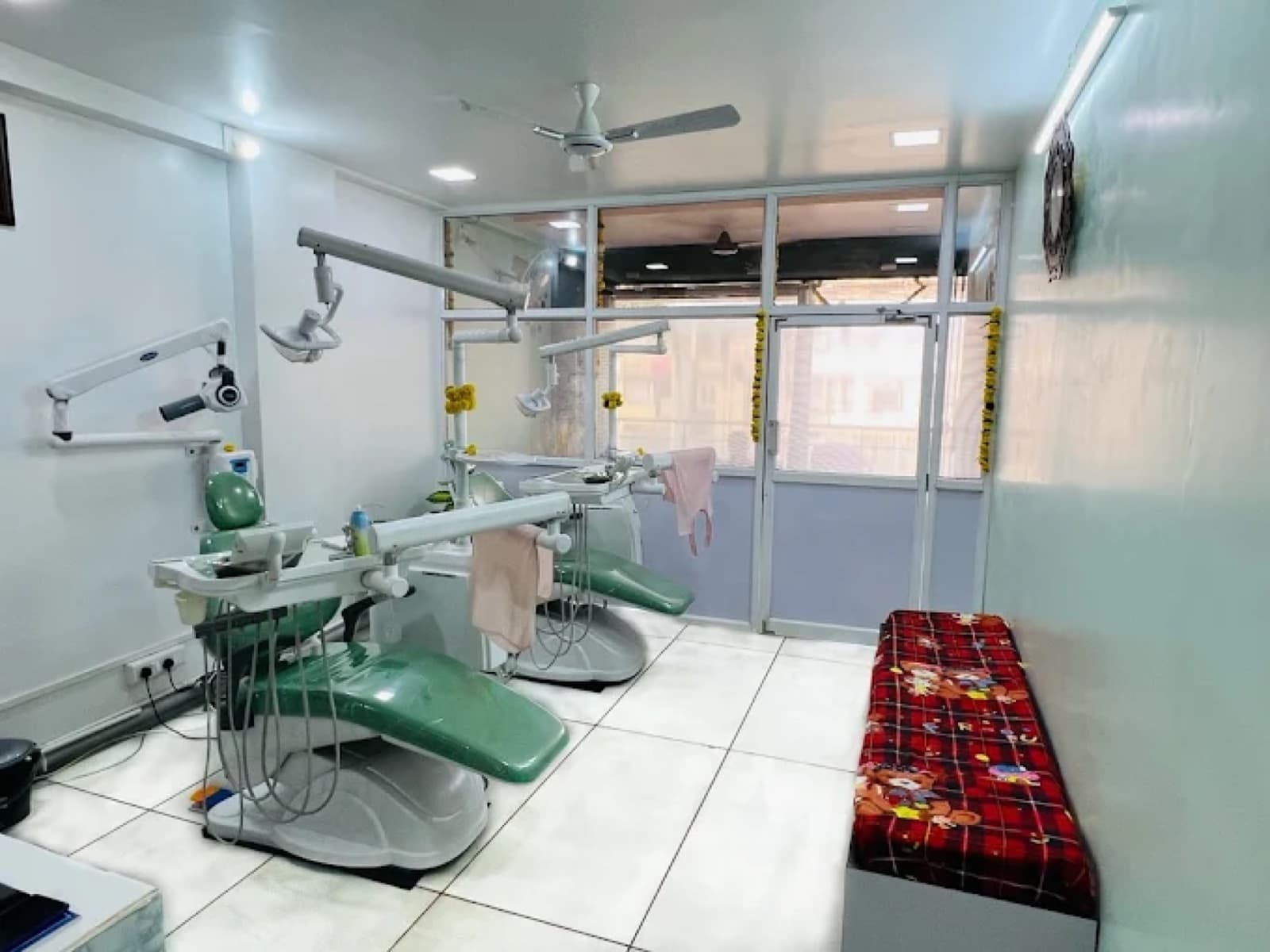Bright treatment room at Nirvana Dental Care with modern dental chairs